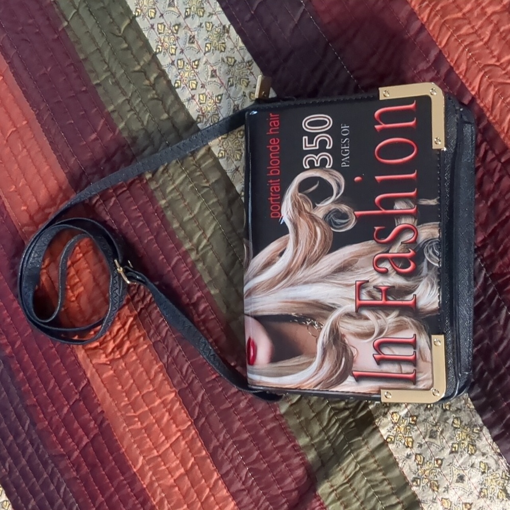 Crossbody/shoulder strap adj. Mid sized bag, w/ with zipper closure, zip pouch